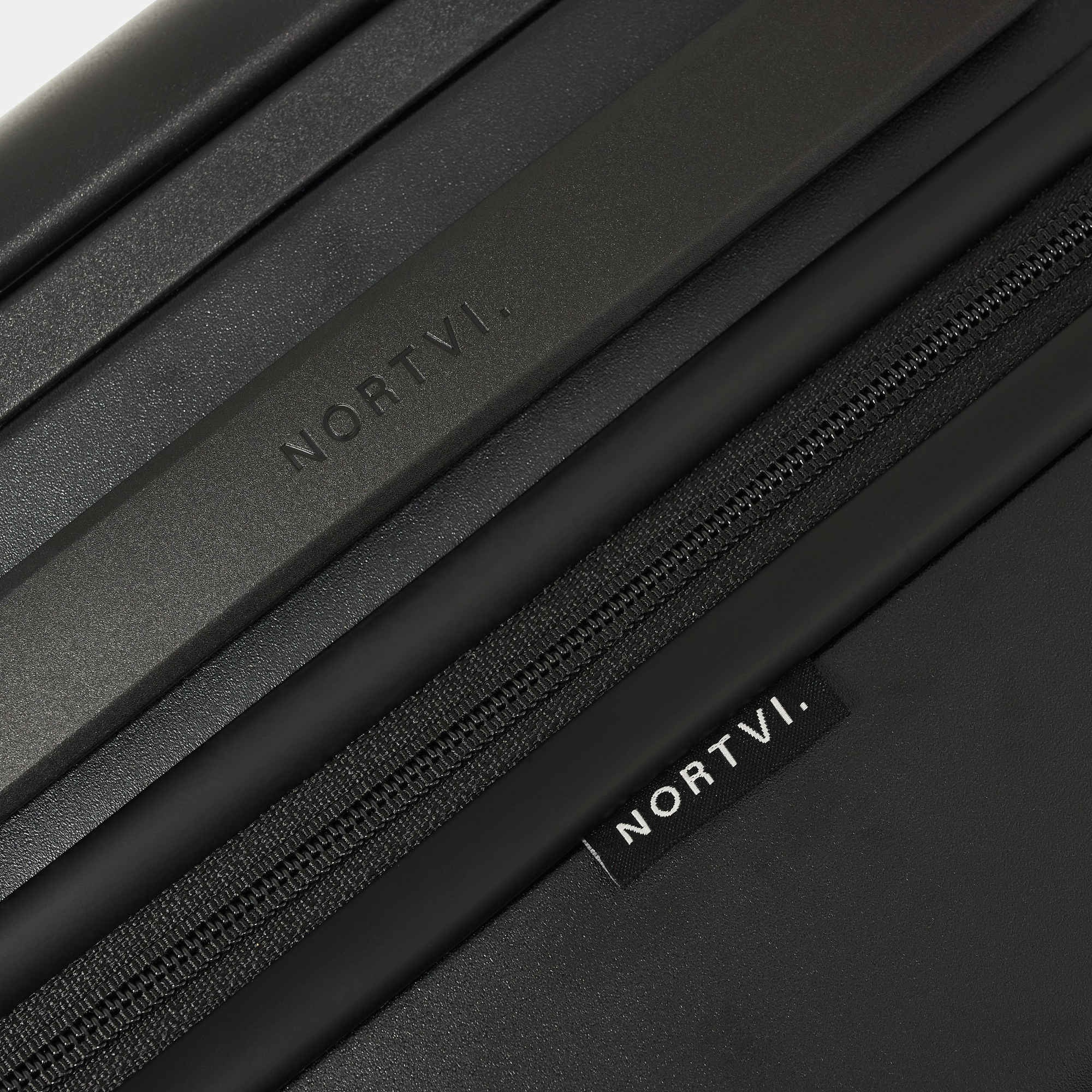 NORTVI sustainable design suitcase black made of durable material.
