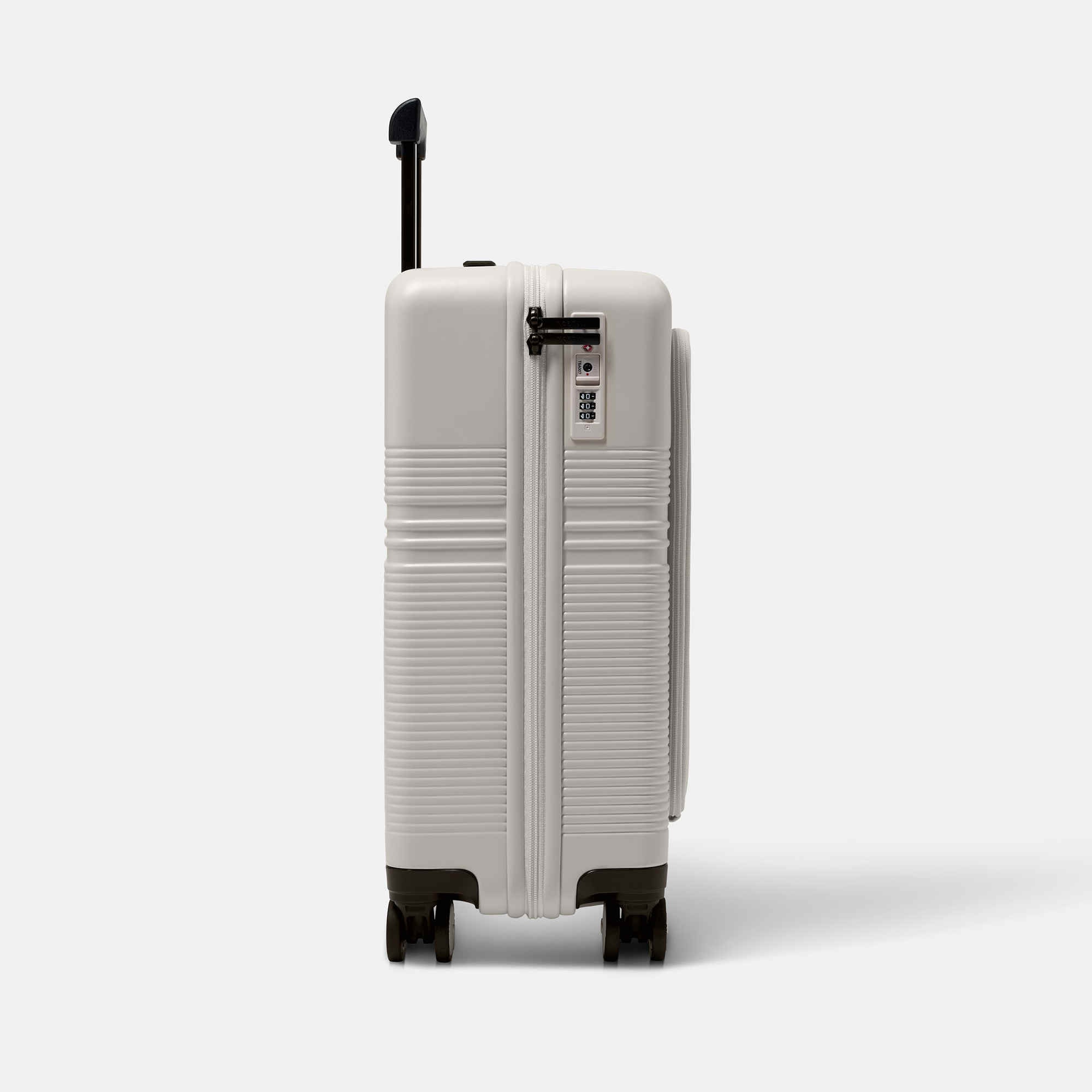 NORTVI sustainable design white suitcase with laptop compartment made of durable material. Perfect travel trolley to use as hand luggage.